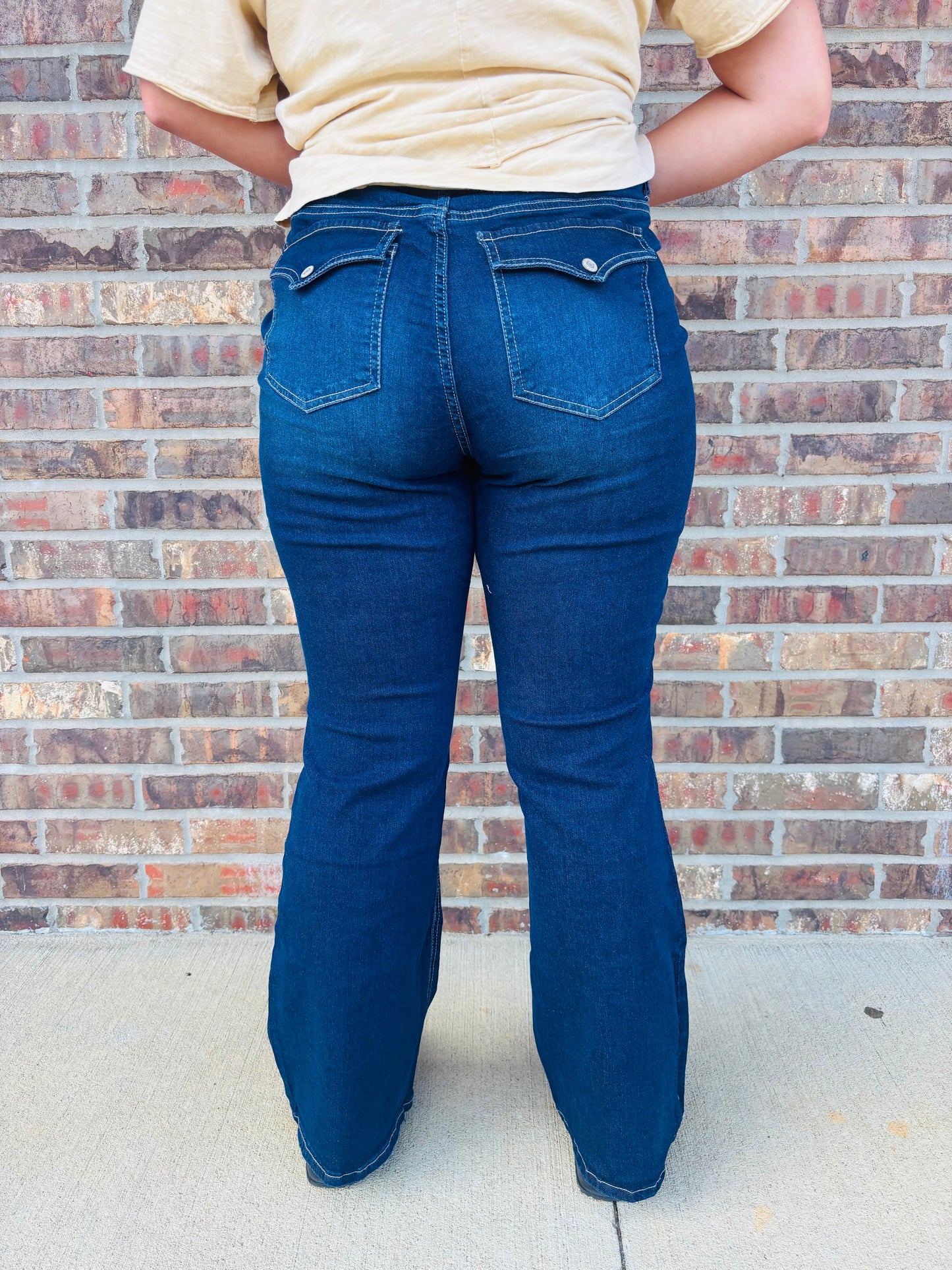 Sam Mid Rise Bootcut Jean